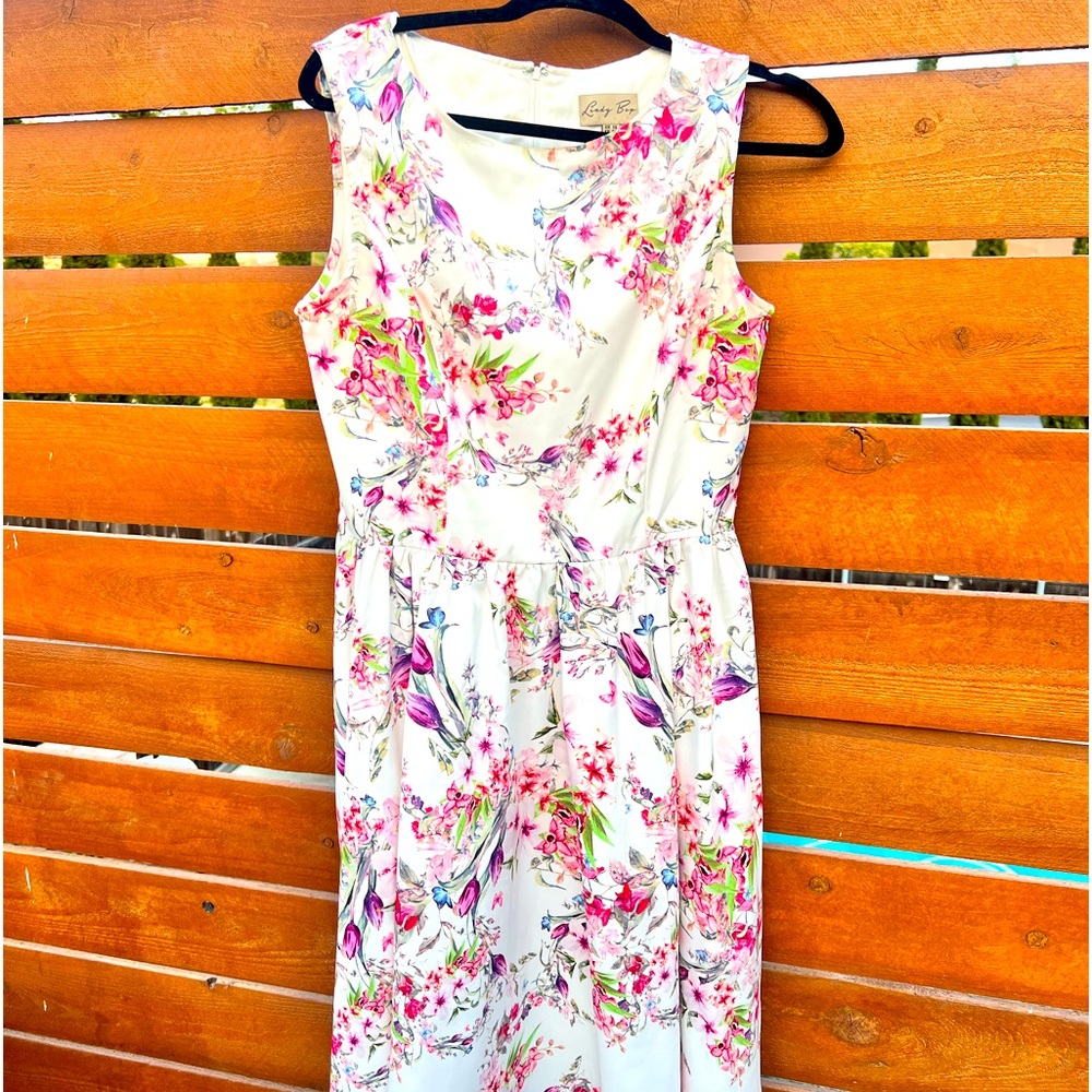 Floral summer party dress. In excellent condition. 10.